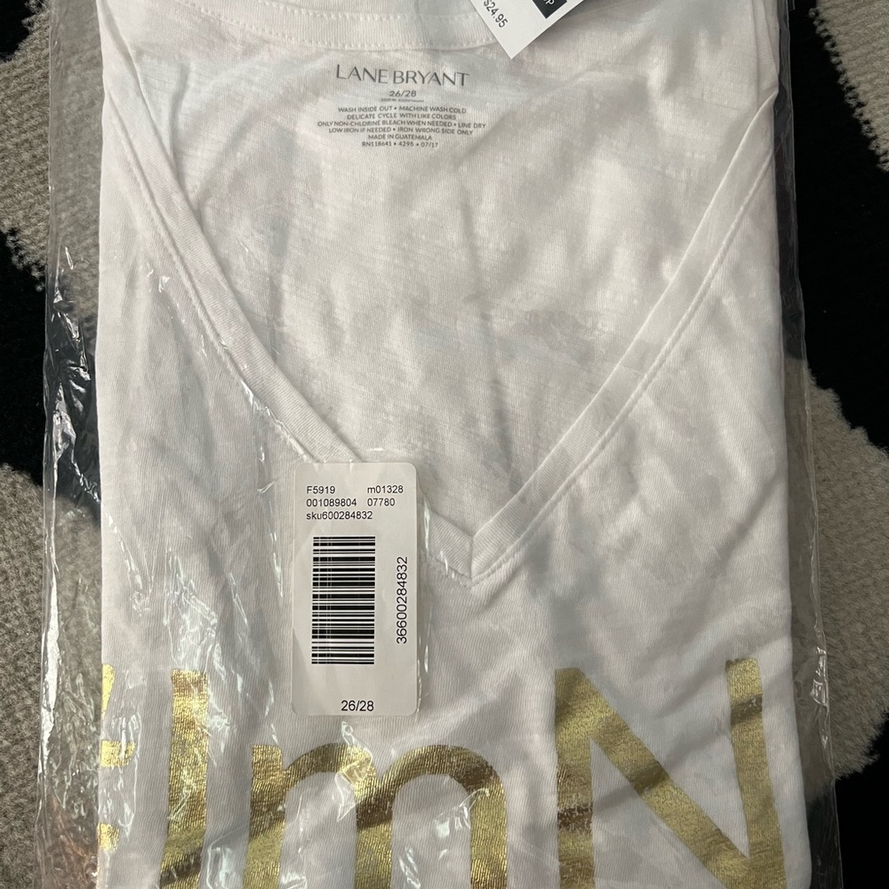 NWT Lane Bryant’s, v-neck, “I’m No Angel” T-shirt. 26-28. White/gold color.
